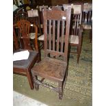 A primitive peg-joyned Oak hall/side Chair having a solid seat,