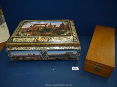 A hinged Oak box approx. 15 3/4" x 4" x 5" and a large illustrated/painted biscuit tin.