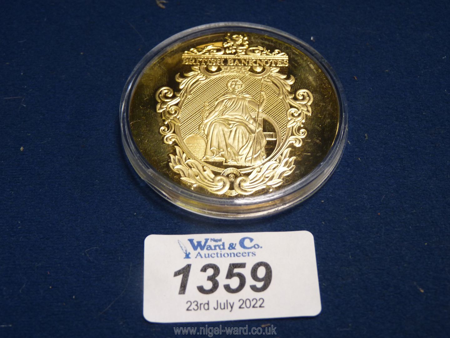 A "Windsor Mint" £5 bank-note Coin, gold plated, commemorating 1793 - 1957.