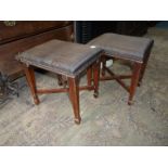 A pair of Mahogany framed rectangular Stools having dark fabric upholstered tops,