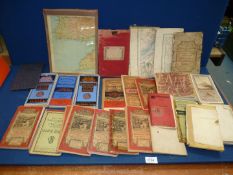 A quantity of old fabric backed survey maps, Fores's Travellers Companion of England and Wales,