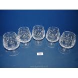 Five Waterford 'Lismore' Brandy glasses (two chipped and cracked).