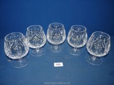 Five Waterford 'Lismore' Brandy glasses (two chipped and cracked).