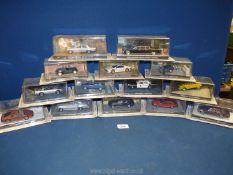 A box containing a quantity of 1:43 scale car models from 'The James Bond Car Collection',