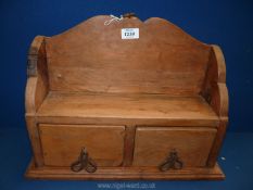 A rustic pine spice cupboard with two drawers, 17 3/4'' wide x 13'' high x 6'' deep.