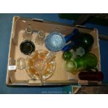 A quantity of coloured and clear glass including vases, candlesticks, dessert dishes etc.