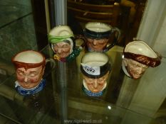 Five Royal Doulton character jugs including Fat Boy, Drake, Sairey Gamp, Tony Weller, etc.