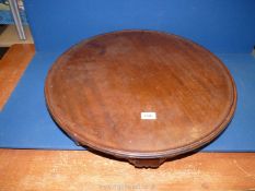 A W.F. Greenwood & Son Ltd. wooden lazy Susan, 24" diameter x 3 1/2" high.