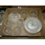 Six old pressed glass grapefruit dishes and a small quantity of frosted glass dessert dishes.