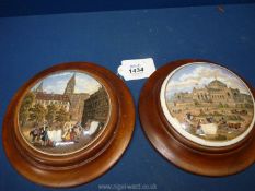 Two 19th Century Pratt pot lids in fitted mahogany frames, one of the Philadelphia exhibition 1876.