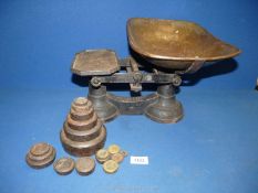 A set of weighing scales - Class II - up to 14lbs, with weights from 1/4 oz to 4lbs.