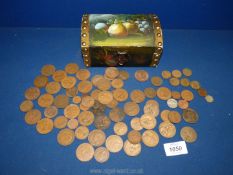 A painted box containing pre-decimal coins including pennies, half penny, threepences, etc.