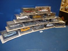 A box containing a quantity of 1:43 scale car models from 'The James Bond Car Collection',