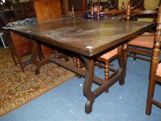 A contemporary darkwood extending Dining Table,