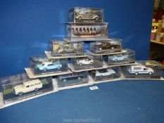 A box containing a quantity of 1:43 scale car models from 'The James Bond Car Collection',