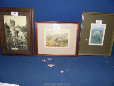 A wooden framed photo of an Artist at work,