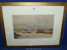 A framed and mounted watercolour depicting a coastal scene, signed lower right H.