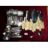 A quantity of cutlery including Sheffield sterling silver knives, epns forks and spoons.