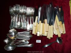 A quantity of cutlery including Sheffield sterling silver knives, epns forks and spoons.