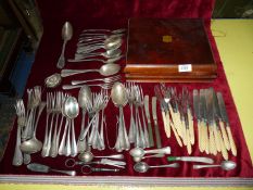 A quantity of epns and plated cutlery to include knives and forks with twist bone handles, spoons,