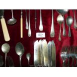 A quantity of miscellaneous cutlery including fish eaters, nickel silver spoons,