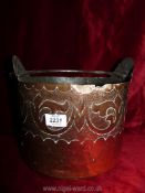 A copper coal bucket with straight sides and embossed detail, 10½" diameter x 10" high.