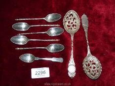 Four matching silver teaspoons with twist handles and detailing to the spoons- hallmarks rubbed