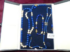 A non-matching necklace, bracelets and earrings with Lapiz Lazuli and cultured pearls,