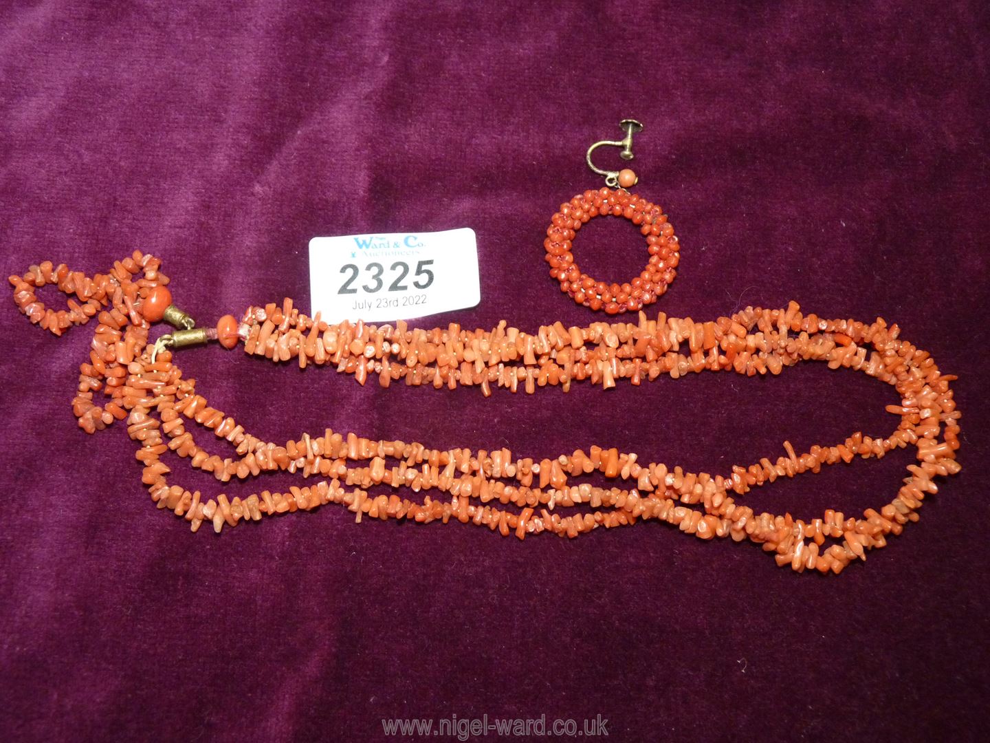 A pretty three strand Coral necklace.