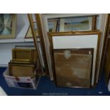 A quantity of picture frames.