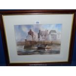 A framed and mounted watercolour depicting a harbour scene, indistinctly signed lower left.