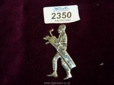 A 925 sterling silver brooch in the form of a Caddie carrying a golf bag. 8.5 gms approx.