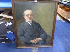 A large framed oil on canvas depicting three quarter portrait of a seated gentleman,