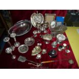 A box of Epns items including trays, wine bottle basket, goblets, frames, bud vases, etc.