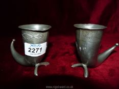 A pair of 19th century Norwegian pewter stirrup cups,