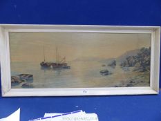 A white framed Print on board depicting Fishing boats anchored at cove.