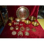 A quantity of various brass including eight horse brasses, decorative tray, bucket etc.