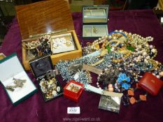 A quantity of costume jewellery, beads, cufflinks, wristwatches, rings etc.