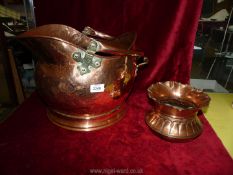 A copper coal bucket and pot.