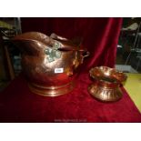 A copper coal bucket and pot.