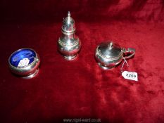 A Silver condiment set with Bristol blue glass liners, makers William Neale & Sons, Birmingham 1929,