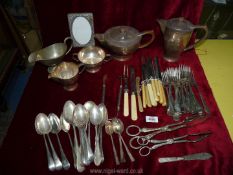 A quantity of plated cutlery and a four piece teaset.