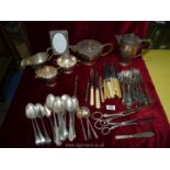 A quantity of plated cutlery and a four piece teaset.