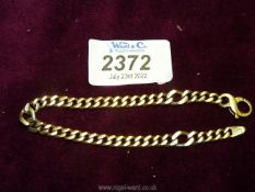 An 18ct gold flat link bracelet with three white gold larger links at intervals that have white