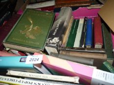 A box of books to include; Fire and Sword in the Sudan, The Social Contract by Robert Ardrey,