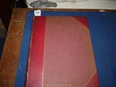 A red leather bound new edition of The Vision of Hell by Dante Alighieri,