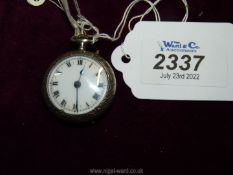 A ladies silver Fob Watch with engineered case and London import mark, dated 1919.