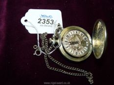 A silvered case "Molnija"crown-wound pocket watch the case having trailing foliage in relief,