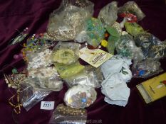 A quantity of loose beads and fastenings.