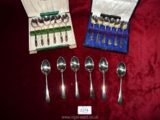 Three boxes of epns teaspoons.